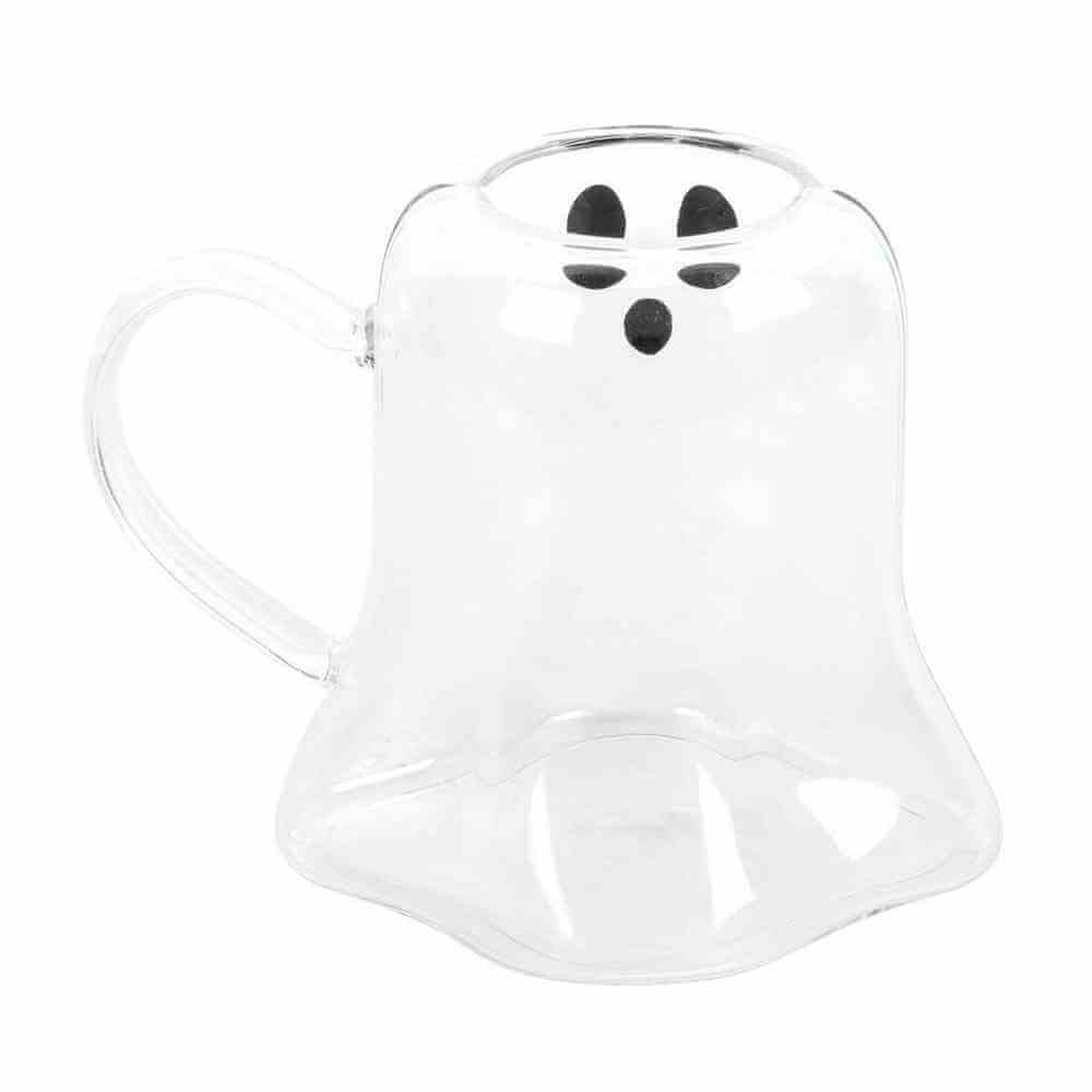 Ghost-shaped clear glass mug with black face and curved handle