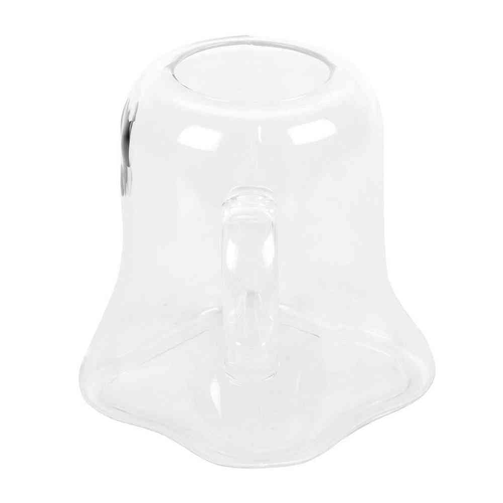 Ghost-shaped clear glass mug with curved handle, transparent body