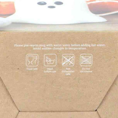 Glass ghost mug care label with icons and washing instructions