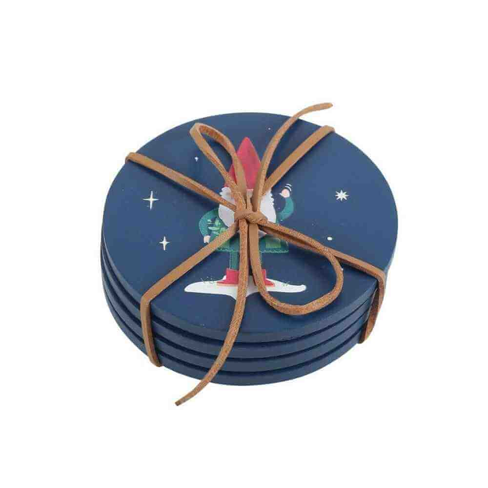Stacked round navy coasters with gnome illustration and twine bow wrap