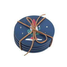 Stacked round navy coasters with gnome illustration and twine bow wrap