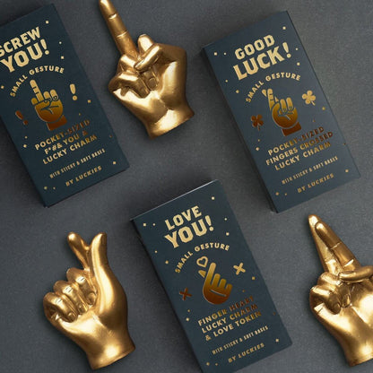 Gold tone crossed-fingers lucky charm ring holder set with matching boxes