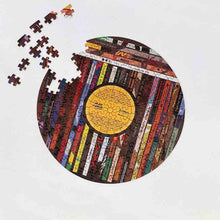 Vinyl-themed circular jigsaw puzzle with colorful record stripes and yellow center disc