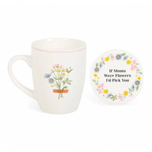 White ceramic mug with flower-pot bouquet print and pink rim; matching floral coaster with quote