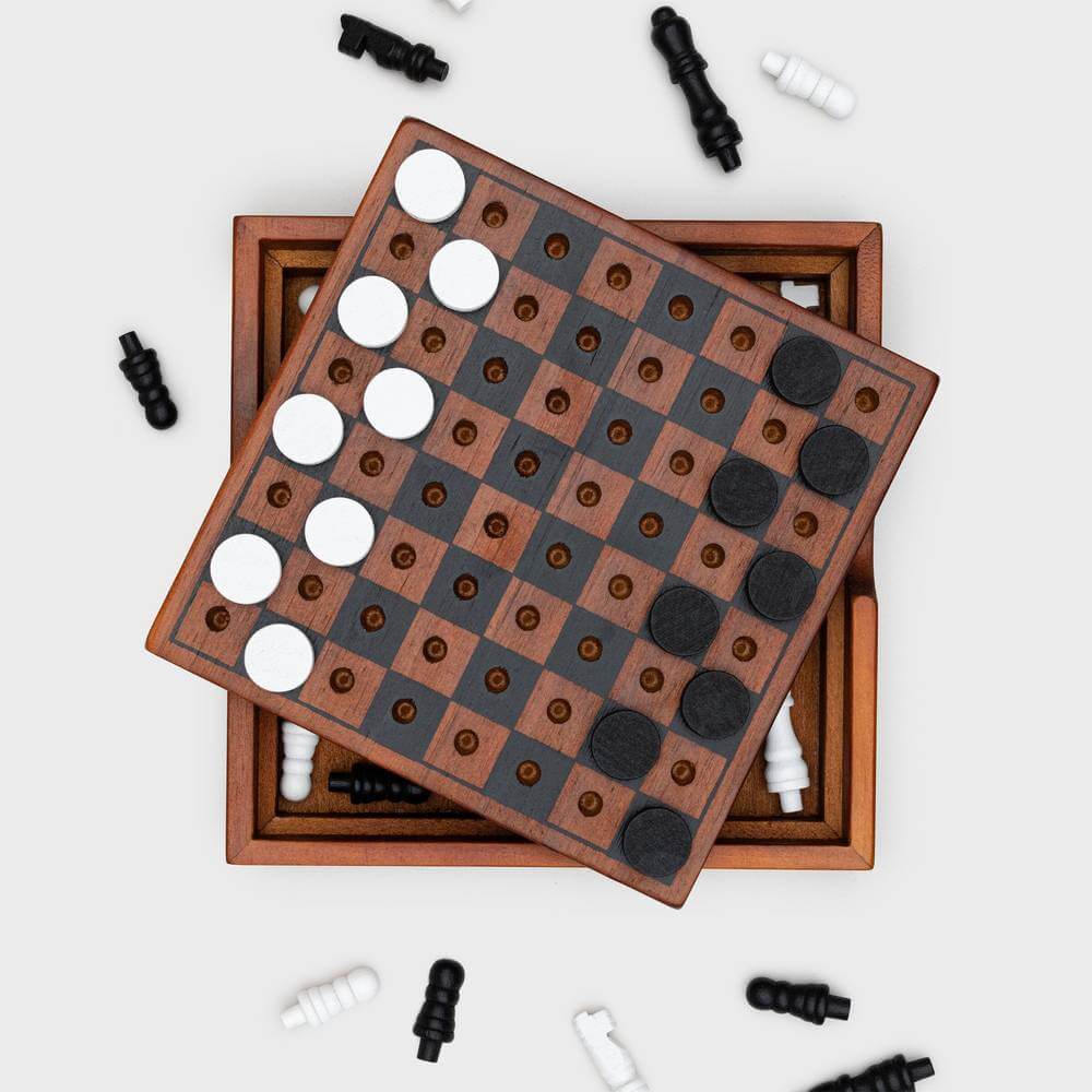 Wooden chess and checkers set with two boards and mixed dark and white pieces