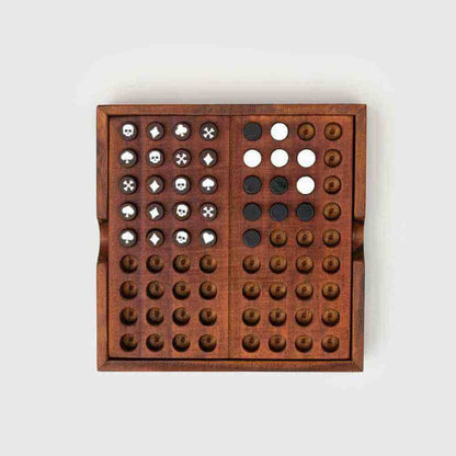Wooden codebreaker board game with peg grids and white circles