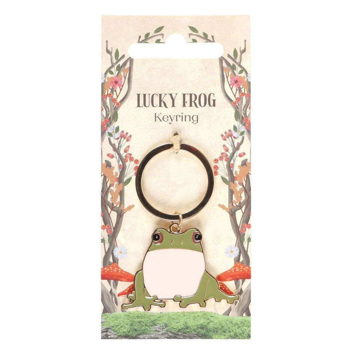 Frog keyring card with green and cream frog charm visible through packaging