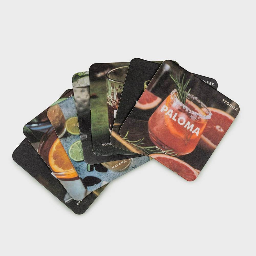 Cocktail recipe coaster cards with colorful printed cocktail artwork, set of coasters.