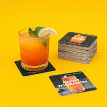 Cocktail recipe coasters, including a stacked set and a drink on a black coaster.
