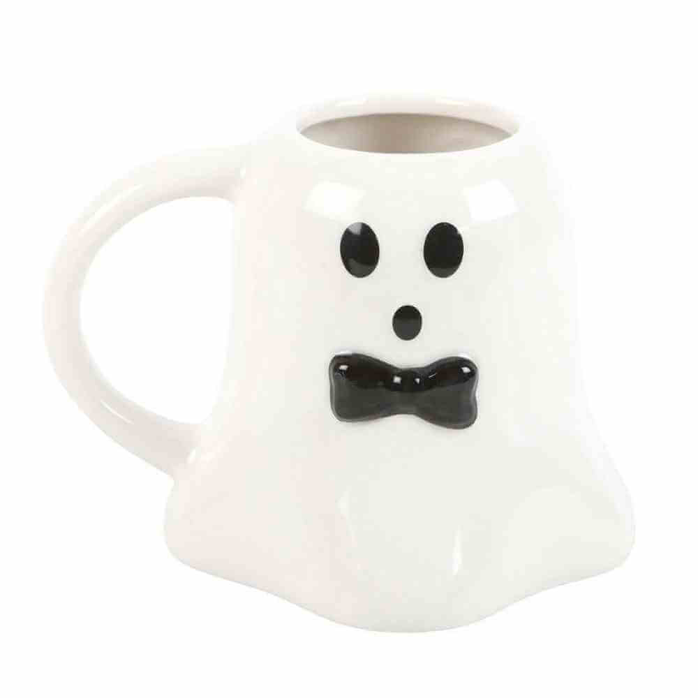 Ghost-shaped ceramic mug, white with black dot eyes and bow-tie smile