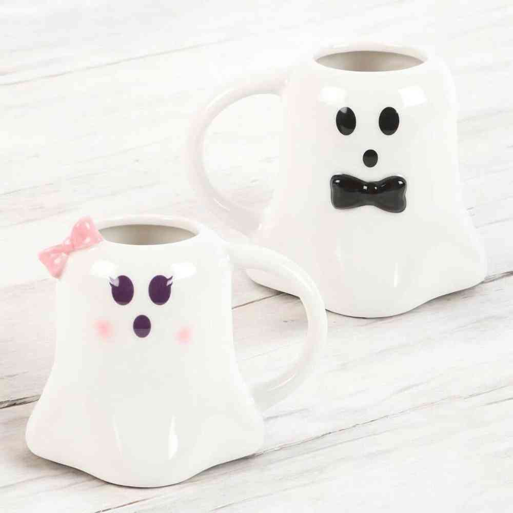 Ghost-shaped ceramic mug, white with purple dot eyes and small blush