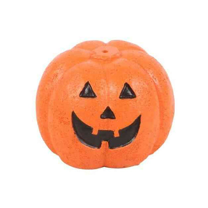 Orange jack-o'-lantern incense stick holder with triangle eyes and smile