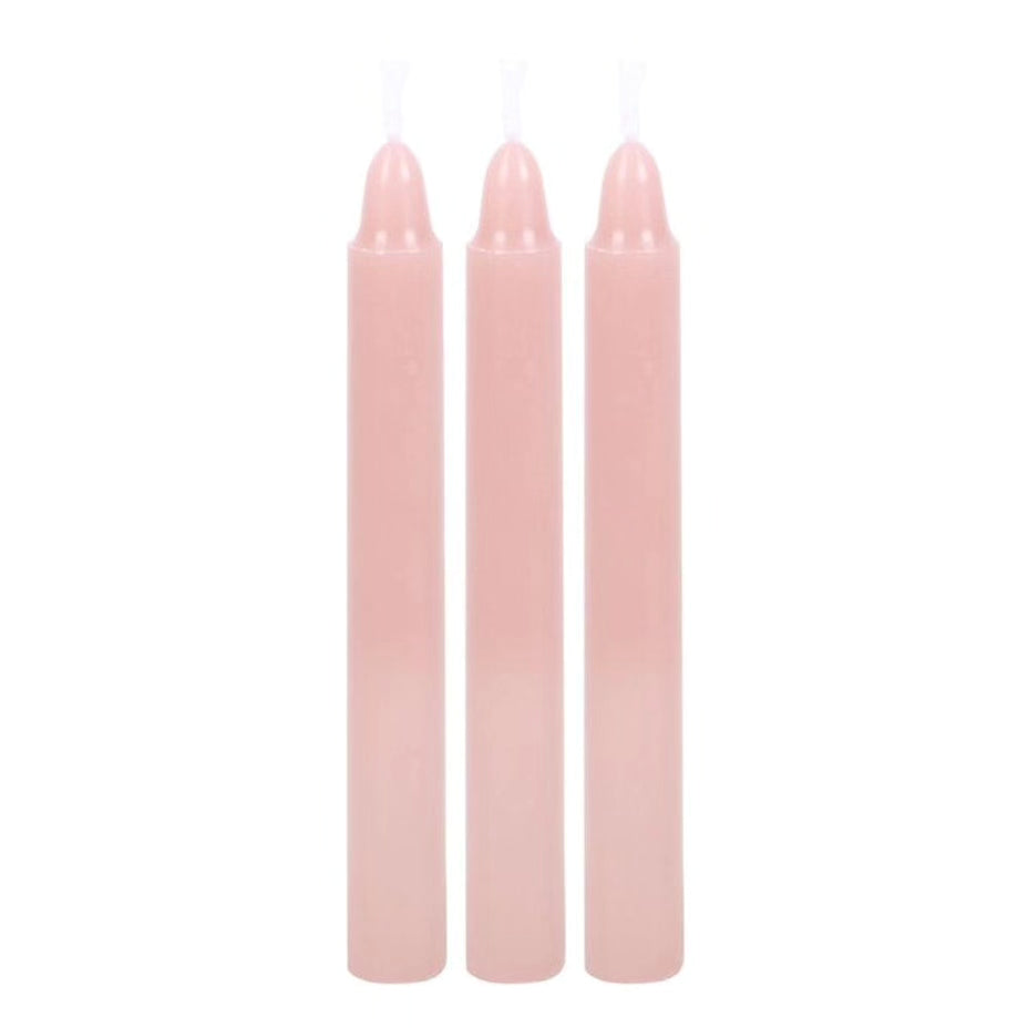 Set of three pale pink unscented pillar candles