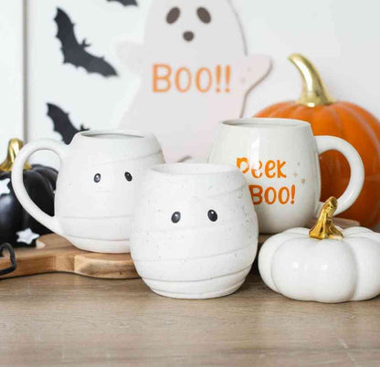 Set of white ghost mugs with orange “Peek a BOO!” text and ghost-face details