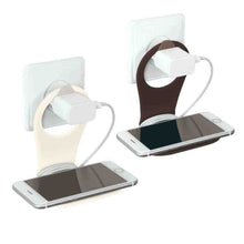 Phone holder with cable tidy, light and dark pads with cables and smartphones