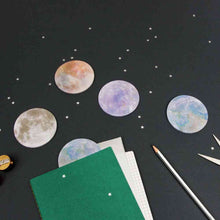 Planet-themed sticky note set with round planet stickers and graph paper sheets