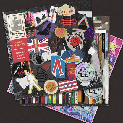 Multiple jigsaw puzzle packs with pop-music themed designs and loose pieces