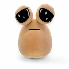 Beige plush alien soft toy front view with big black eyes and horizontal mouth