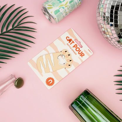 Cat Pour bottle opener package with beige striped cat magnet on a retail card.