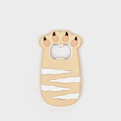 Beige cat bottle opener magnet with striped belly and a silver bottle-cap slot.