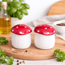 Red polka-dot ceramic mushroom salt and pepper shakers, two-piece set