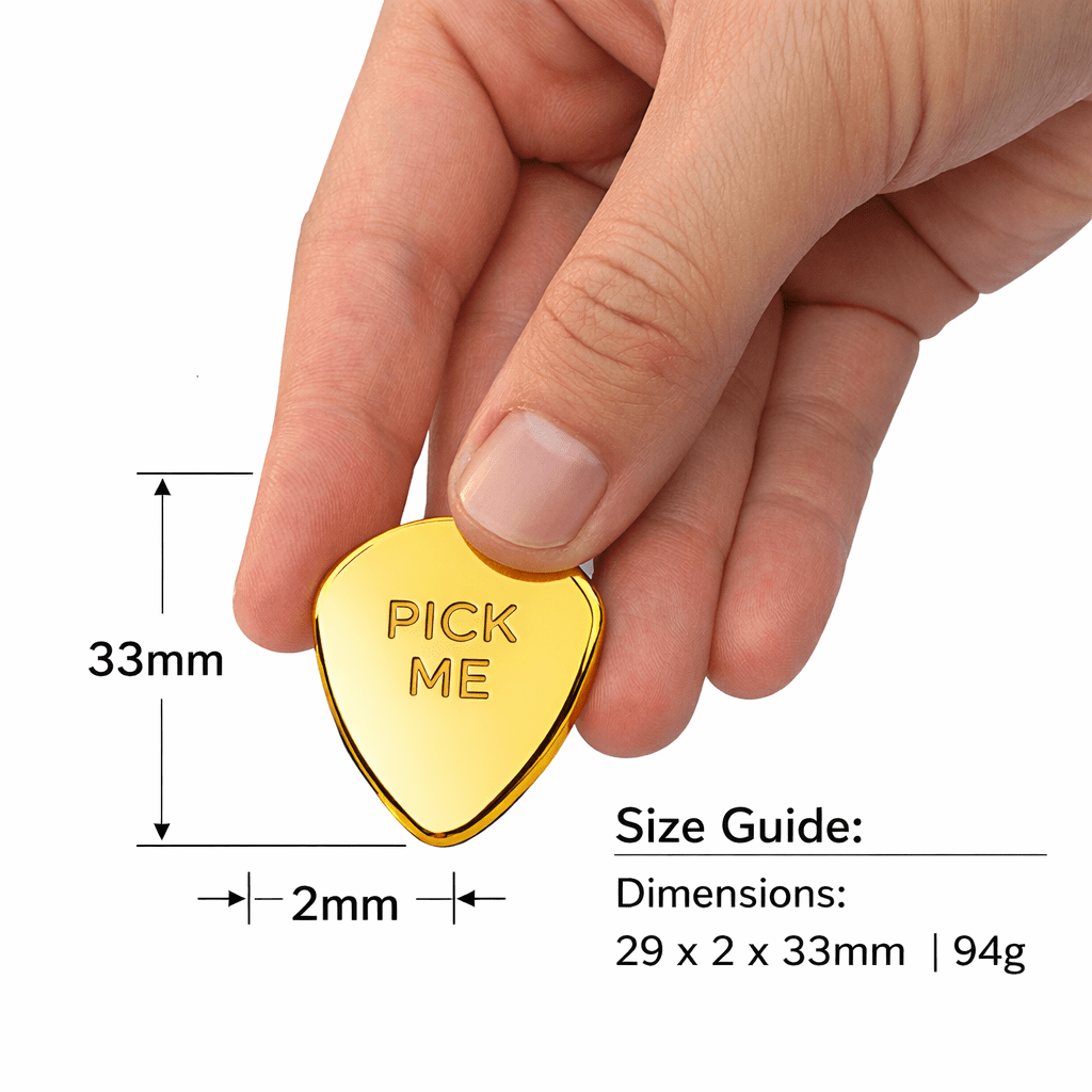 Gold-plated guitar pick charm with “Pick Me” front engraving, held in hand.