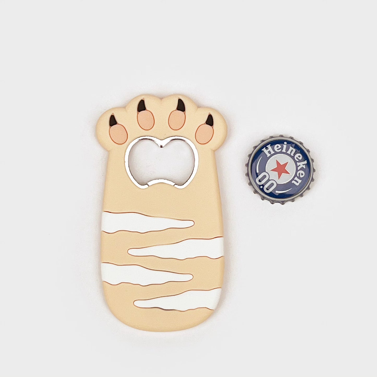 Cat bottle opener magnet shaped like a beige striped cat with a silver bottle-cap slot.