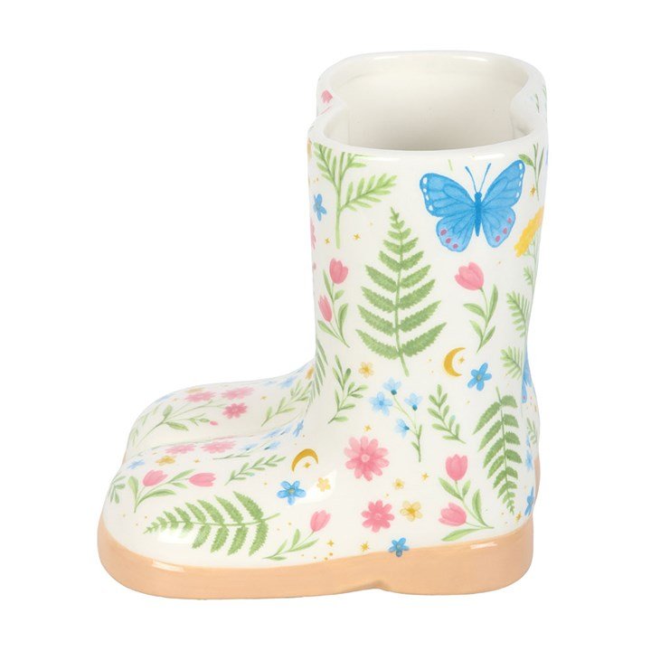 Ceramic boot planter with blue butterfly and leaf pattern, open white interior.