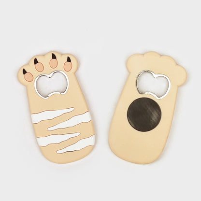 Cat bottle opener magnet showing striped side and plain side with a dark circular magnet.