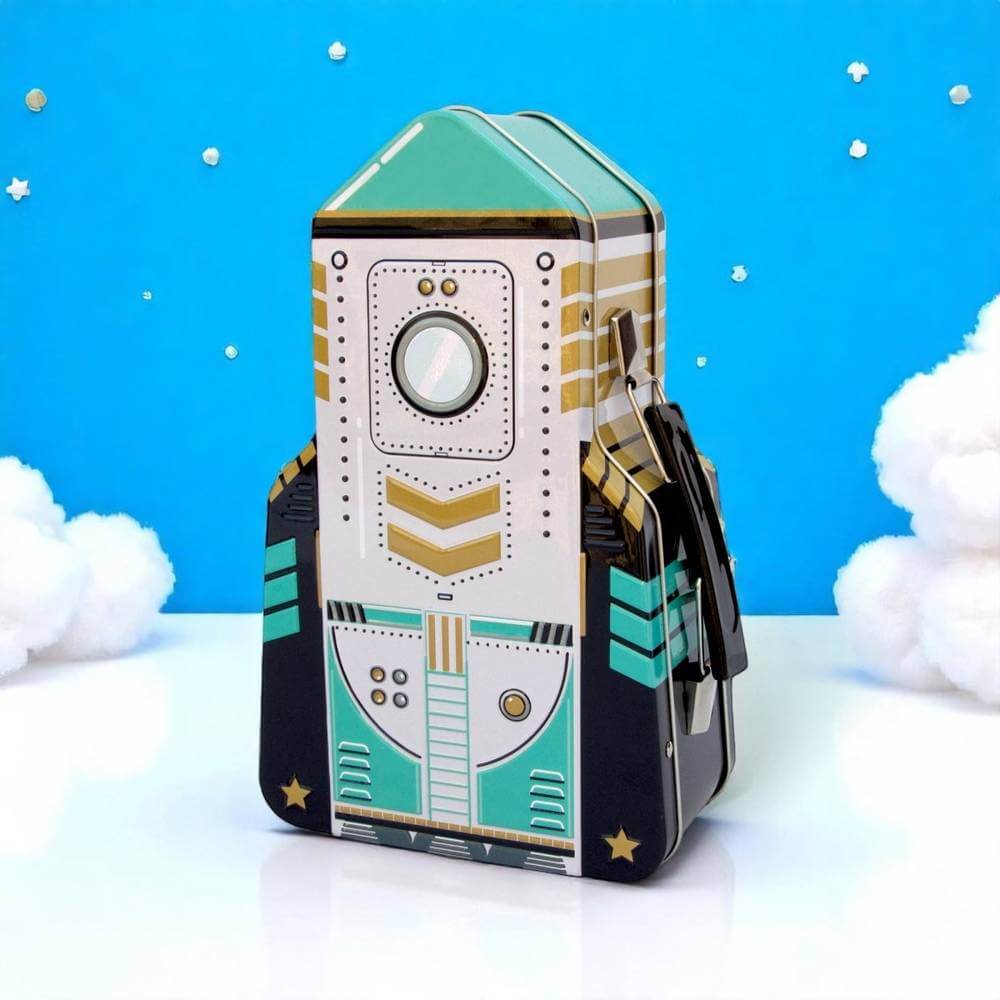 Rocket-shaped lunch box with teal/white rocket graphic and side handle.