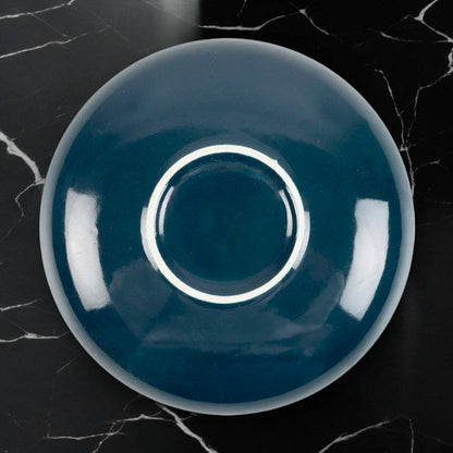 Round trinket dish with dark blue glossy top and white inner ring detail