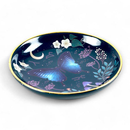 Round trinket dish with blue moth and moon graphic, gold edge