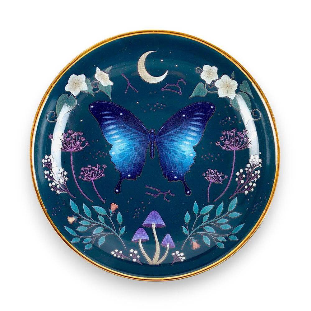 Round trinket dish with blue moth, moon, flowers, and gold rim