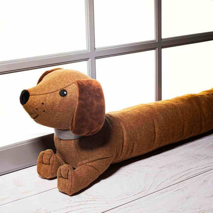 Dachshund draft excluder plush, front view with long body, floppy ears, and paws