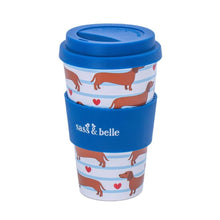 Travel coffee cup with dachshund pattern, blue lid, stacked sleeve design