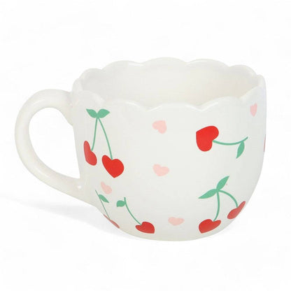 White scalloped mug with red and pink heart pattern and green cherry stems