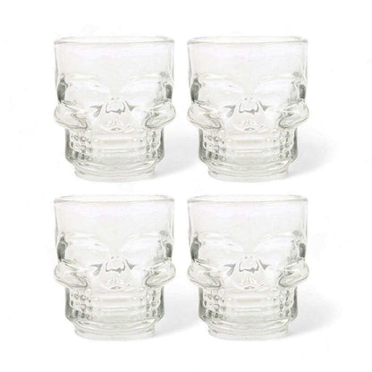 Set of 4 clear skull shot glasses, top view showing etched skull face designs