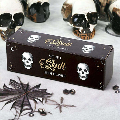 Skull shot glasses gift box showing set of 4, skull icons and brand lettering
