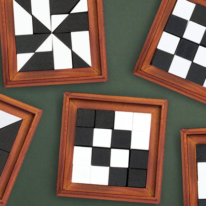 Set of framed tangram puzzles with black-and-white geometric tile patterns