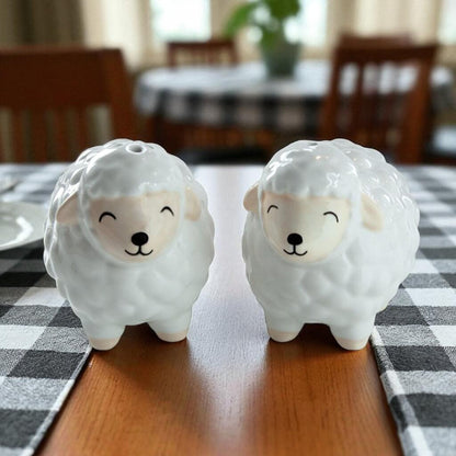 Sheep salt and pepper shaker pair, one gray and one cream sheep figurine with cute face