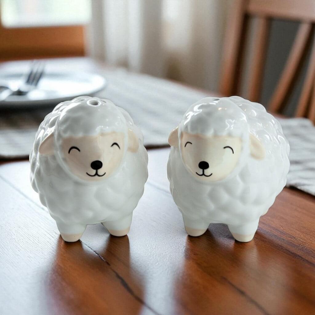 Sheep-shaped ceramic salt and pepper shakers, gray and cream sheep with faces, rounded wool body