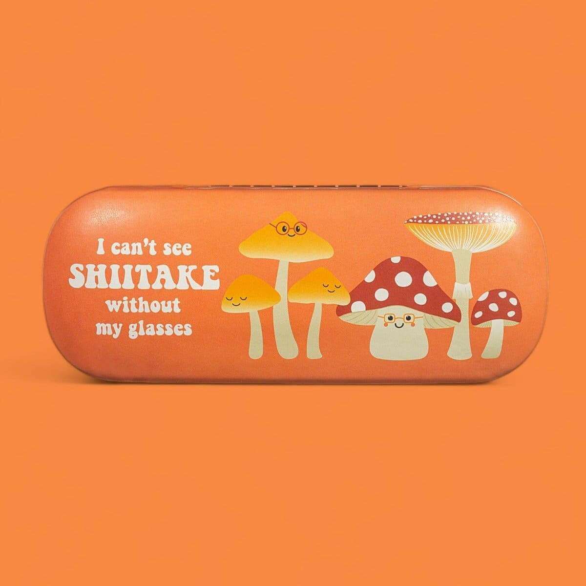 Orange mushroom-print eyeglasses case with cartoon mushrooms across the front.
