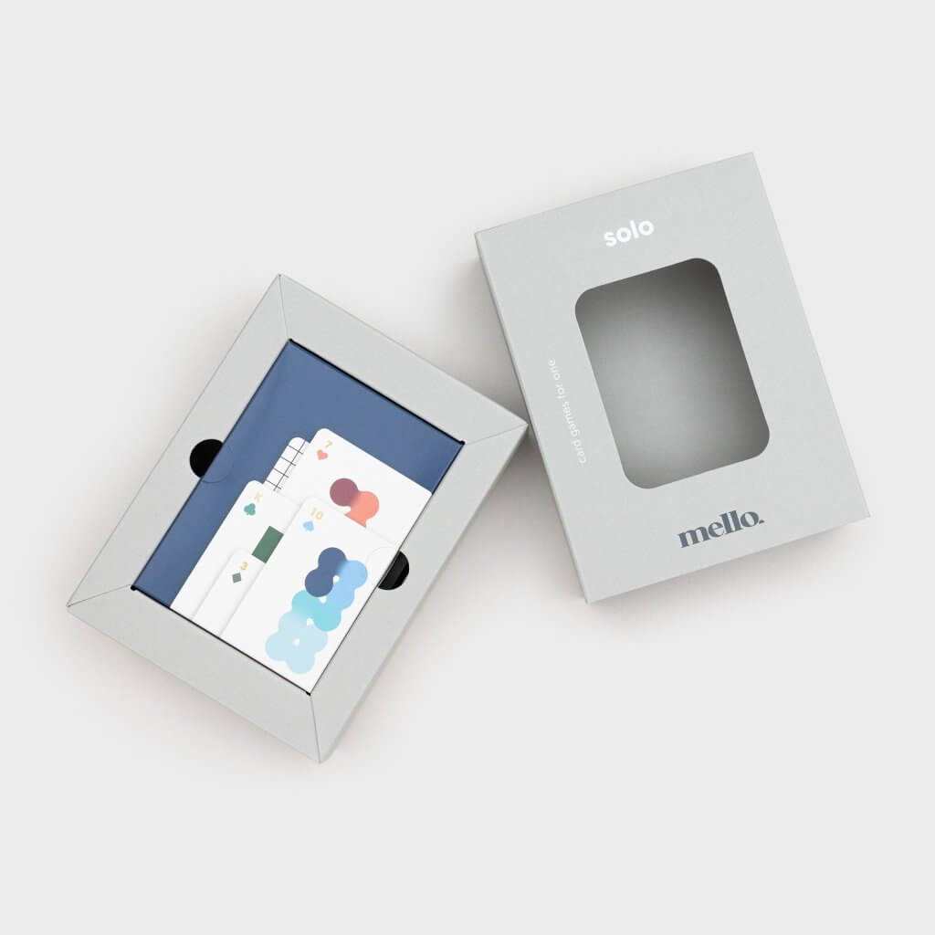 Solo Mello playing cards: closed box and open box showing card artwork inside