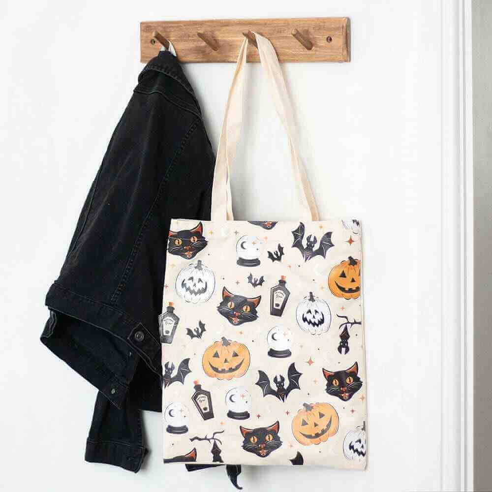 Poly-cotton tote bag with Halloween cat, pumpkin, bat and cauldron print