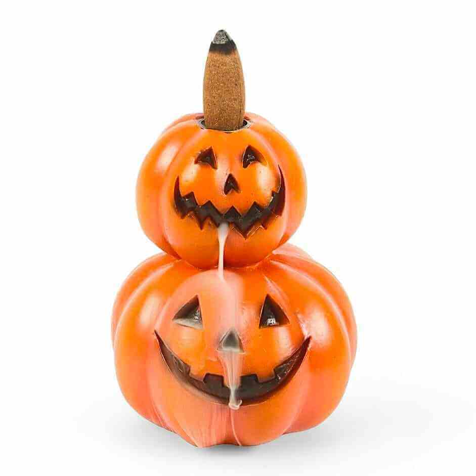 Stacked jack-o-lantern backflow incense burner with two stacked pumpkins and incense stick