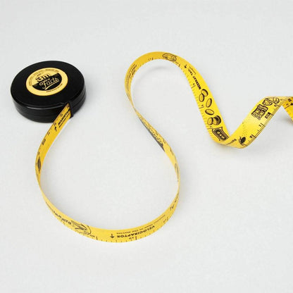 Retractable yellow tape measure loop with marked numbers and black measuring case
