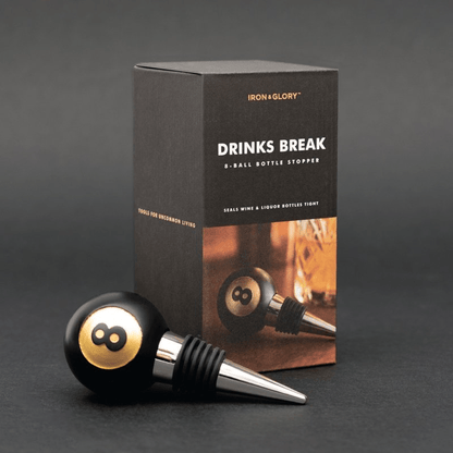 Black 8-ball bottle stopper with stainless spout, shown with retail box