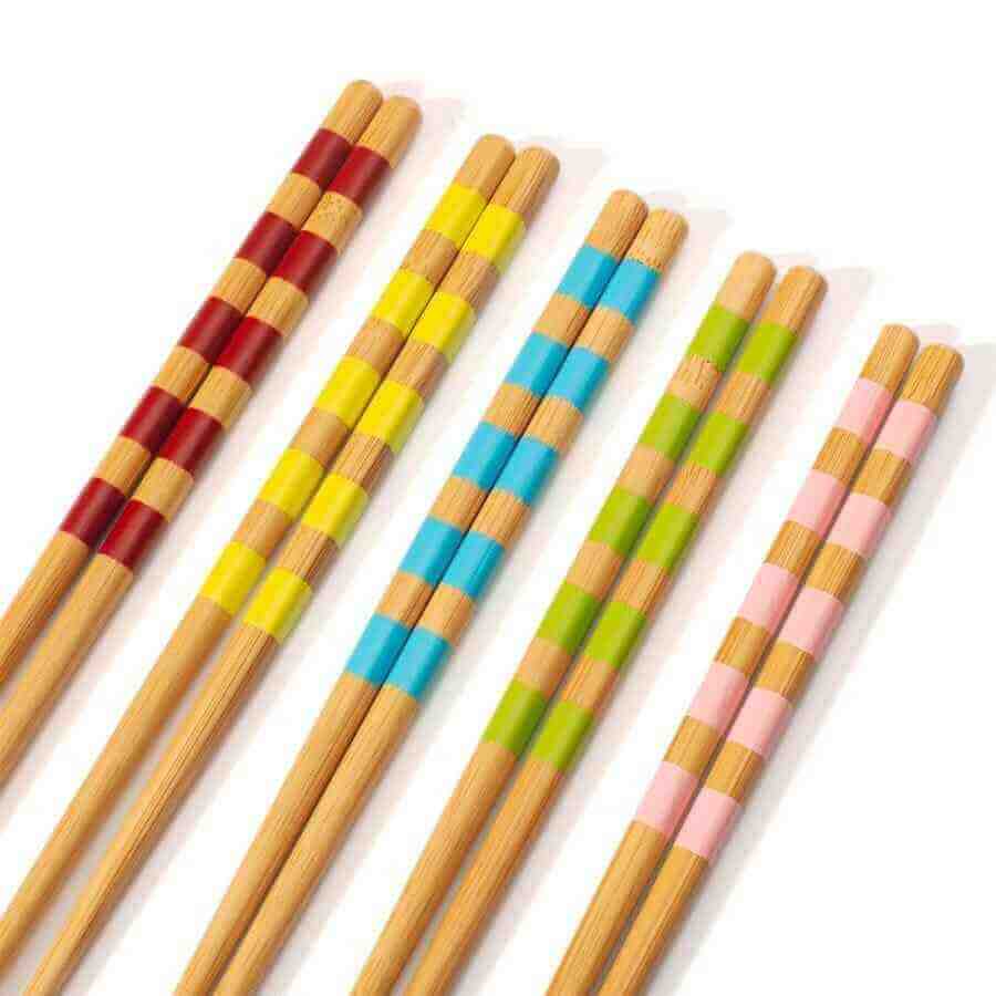 Set of 5 bamboo chopsticks with vibrant red, yellow, and blue striped bands