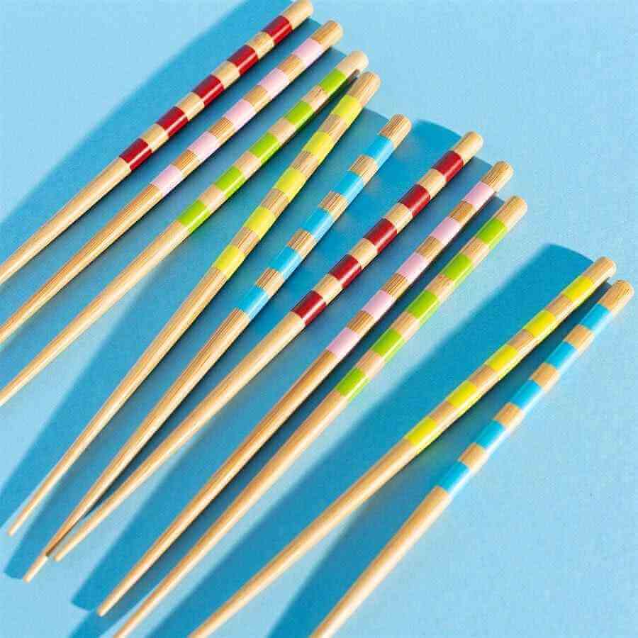 Set of 5 bamboo chopsticks with rainbow striped bands in red, green, blue, yellow