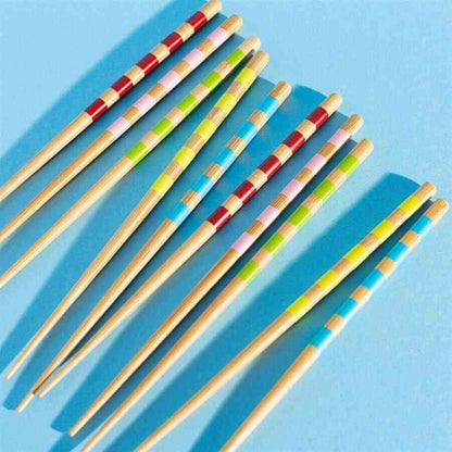 Set of 5 bamboo chopsticks with rainbow striped bands in red, green, blue, yellow